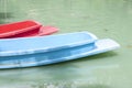 Plastic boat floating in the river. Royalty Free Stock Photo