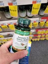 Nature`s Bounty brand Anxiety & Stress relief tablets bottle with store shelves