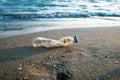 Bottle plastic on stone ground show long life garbage concept Royalty Free Stock Photo