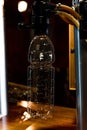 Plastic bottle on a beer bottling line in a bar Royalty Free Stock Photo
