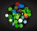 Plastic Bottle Caps Pile. Recycling HDPE Material Group, Circle Polyethylene Lid Set, Colorful Caps Group Royalty Free Stock Photo