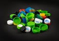 Plastic Bottle Caps Pile. Recycling HDPE Material Group, Circle Polyethylene Lid Set, Colorful Caps Group Royalty Free Stock Photo