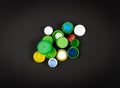 Plastic Bottle Caps Pile. Recycling HDPE Material Group, Circle Polyethylene Lid Set, Colorful Caps Group Royalty Free Stock Photo