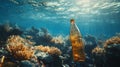 Plastic Bottle Discarded on a Coral Reef Underwater Royalty Free Stock Photo