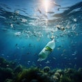 Plastic Bottle Drifting in Ocean Royalty Free Stock Photo