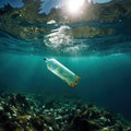 Plastic Bottle Drifting in Ocean Royalty Free Stock Photo