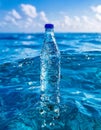 Plastic bottle floating in ocean, environmental pollution concept Royalty Free Stock Photo