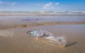 Plastic bottle or garbage on beach Royalty Free Stock Photo