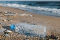 Plastic bottle garbage on the beach Royalty Free Stock Photo