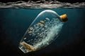plastic bottle with garbage floating in the ocean, creating a visual of pollution Royalty Free Stock Photo