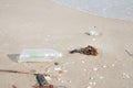 Plastic bottle or garbage on the sand beach. Royalty Free Stock Photo