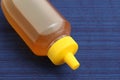 Nature pure honey in plastic bottle Royalty Free Stock Photo