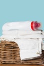 Bottle of Detergent on Stack of Folded White Clothes Royalty Free Stock Photo