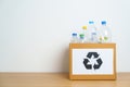 Plastic bottle in paper box at home or office. Recycle garbage Sorting. Plastic Free, Ecology, Environmental, pollution, Dispose Royalty Free Stock Photo