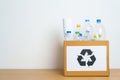 Plastic bottle in paper box at home or office. Recycle garbage Sorting. Plastic Free, Ecology, Environmental, pollution, Dispose Royalty Free Stock Photo