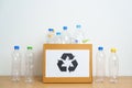 Plastic bottle in paper box at home or office. Recycle garbage Sorting. Plastic Free, Ecology, Environmental, pollution, Dispose Royalty Free Stock Photo