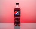 Plastic bottle of Pepsi Cola MAX 0.5 liters on a pink background. Zero calories Pepsi soft drink bottle isolated on pink Royalty Free Stock Photo