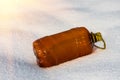 Plastic bottle in the snow Royalty Free Stock Photo