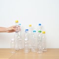 Plastic bottle on table at home or office. Recycle garbage Sorting. Plastic Free, Ecology, Environmental, pollution, Dispose Royalty Free Stock Photo