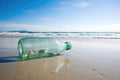 a plastic bottle washed up on a pristine beach Royalty Free Stock Photo