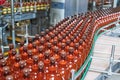 Plastic bottles with beer or carbonated beverage moving on conveyor Royalty Free Stock Photo