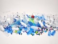 Plastic bottles, plastic caps. Plastic recycling concept. Royalty Free Stock Photo