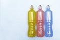 Plastic bottles with colored liquid. Royalty Free Stock Photo