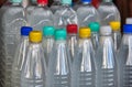 Plastic bottles with colourful caps Royalty Free Stock Photo