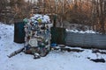 Large stack of old plastic bottles