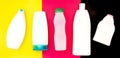 Plastic bottles for cosmetics on colored paper background. cosmetic set. Top view. Shampoo, shower gel, soap. template.