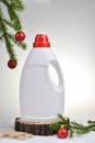 Minimal Christmas background with household chemicals. Plastic. Happy New Year. House and apartment cleaning before Christmas