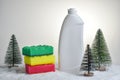 Minimal Christmas background with household chemicals. Plastic. Happy New Year. House and apartment cleaning before Christmas