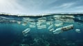 Plastic bottles floating in the ocean polluting the environment