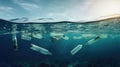 Plastic bottles floating in the ocean polluting the environment