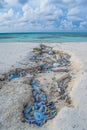 Plastic bottles and garbage at the tropical beach Royalty Free Stock Photo