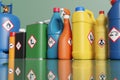 Plastic bottles and metallic tins having with different hazardous warning labels
