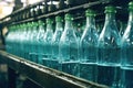 Plastic bottles of mineral water on an assembly line in a bottling factory. Royalty Free Stock Photo