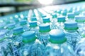 Plastic bottles of mineral water on an assembly line in a bottling factory. Royalty Free Stock Photo