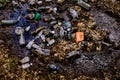 Plastic bottles polluting a lake in the forest Royalty Free Stock Photo