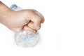 Plastic bottles recycling of a hand squeezed isolated on white background, concept plastic reduction