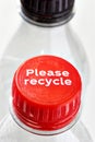 Plastic bottles with red and black bottle caps Royalty Free Stock Photo