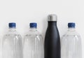 Plastic bottles with reusable bottle made from stainless steel. Plastic free alternative concept, with copy space