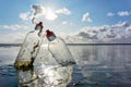 Plastic bottles standing in the sea