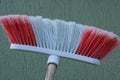 Plastic broom with colored pile