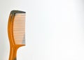 Plastic brown colored hair comb Royalty Free Stock Photo