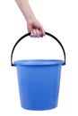 Plastic bucket in hand Royalty Free Stock Photo