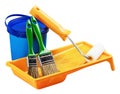 Plastic can with paint, roller, brushes Royalty Free Stock Photo