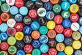 plastic caps from different drinks, from beer, soda, cola, mine