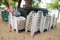 plastic chair and table and umbrella had pack of group when forcast of storm prediction Royalty Free Stock Photo