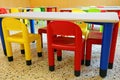 chairs and small tables in a refectory room of a kindergarten Royalty Free Stock Photo